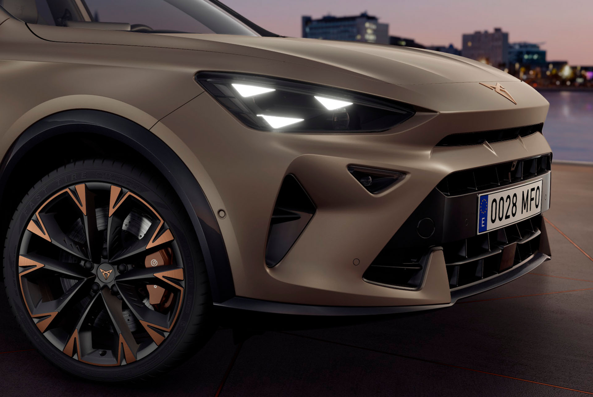 New CUPRA Formentor in century bronze matt, copper accent wheels, pure performance CUPRA Matrix led lights, headlights with the distinctive triangle eye CUPRA signature.