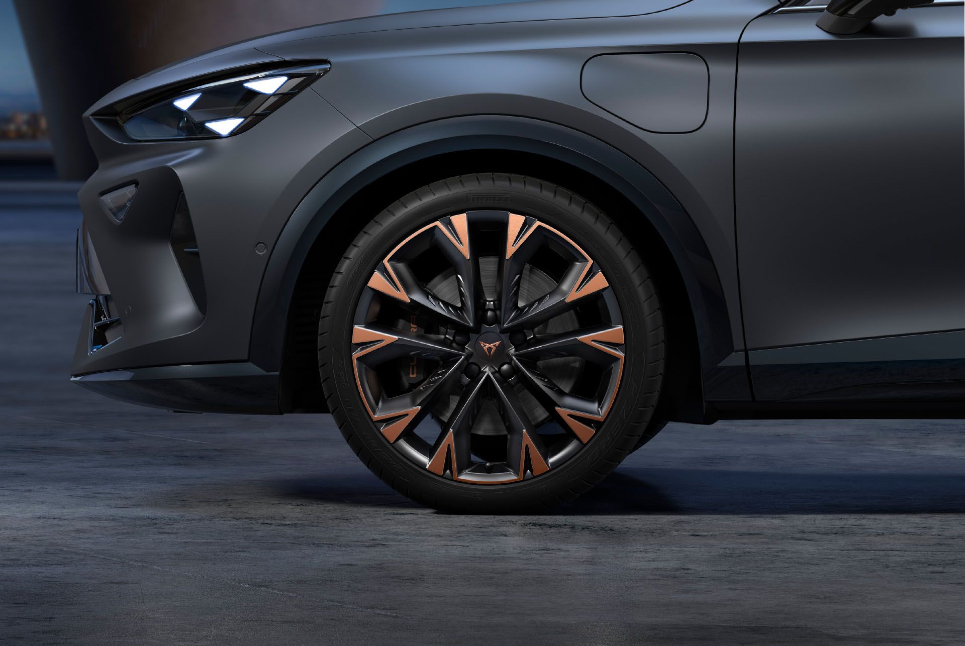 New artic copper and black CUPRA Formentor car wheels, alloys and tyres with logo in the middle, LED headlights.