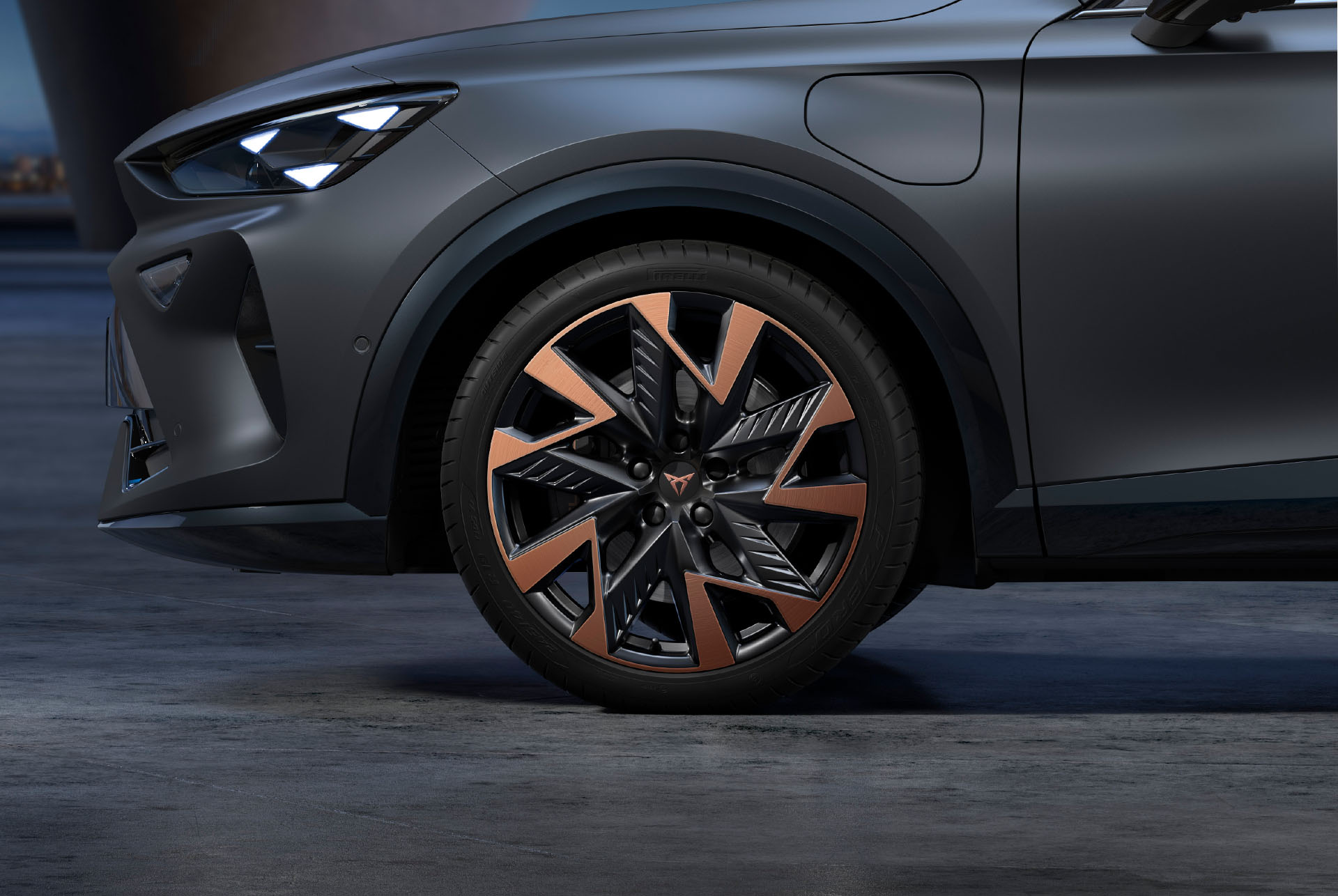 Sandstorm black and copper new CUPRA Formentor alloy car wheels and tyres with logo in the middle.