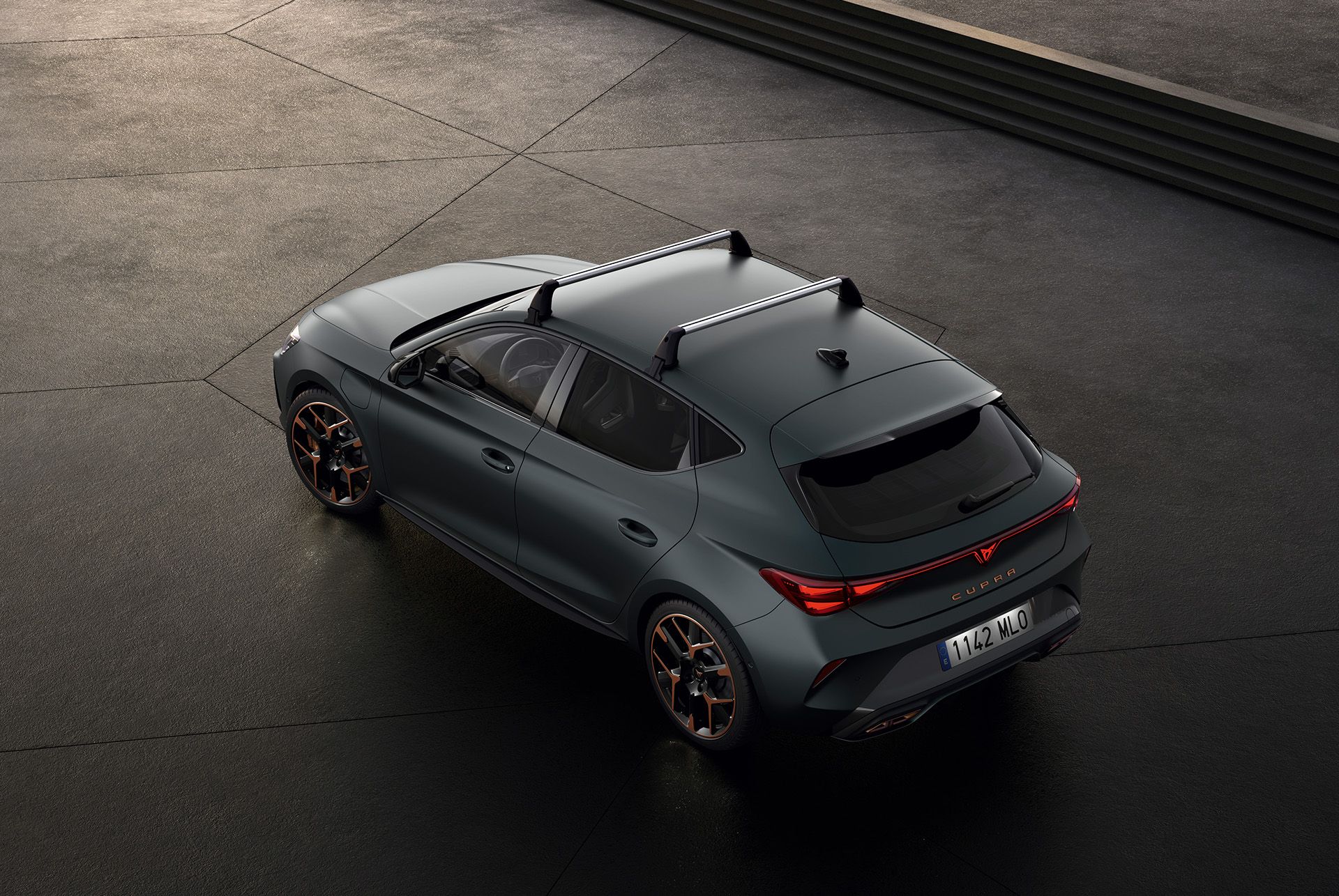 bird’s eye view of new enceladus grey matt cupra leon 2025 with thule car roof bars installed