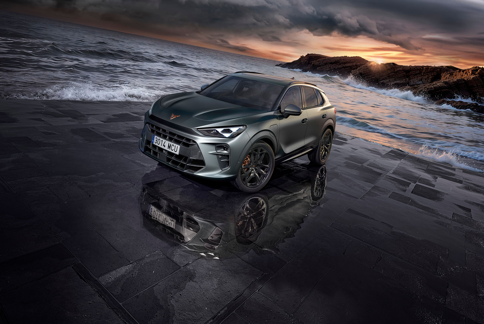 the new cupra terramar 2024 hybrid suv on a wet pavement by the sea, featuring sleek headlights, modern alloy wheels, and a shark-inspired front design.