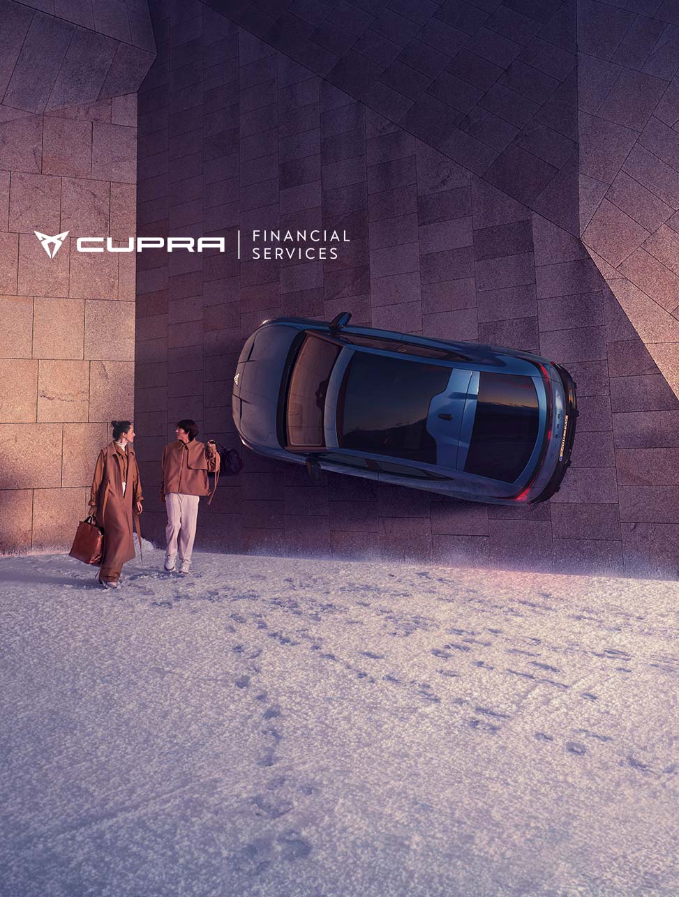 Cupra tavascan electric vehicle obtained from financial services, parked in front of modern architecture and two people.